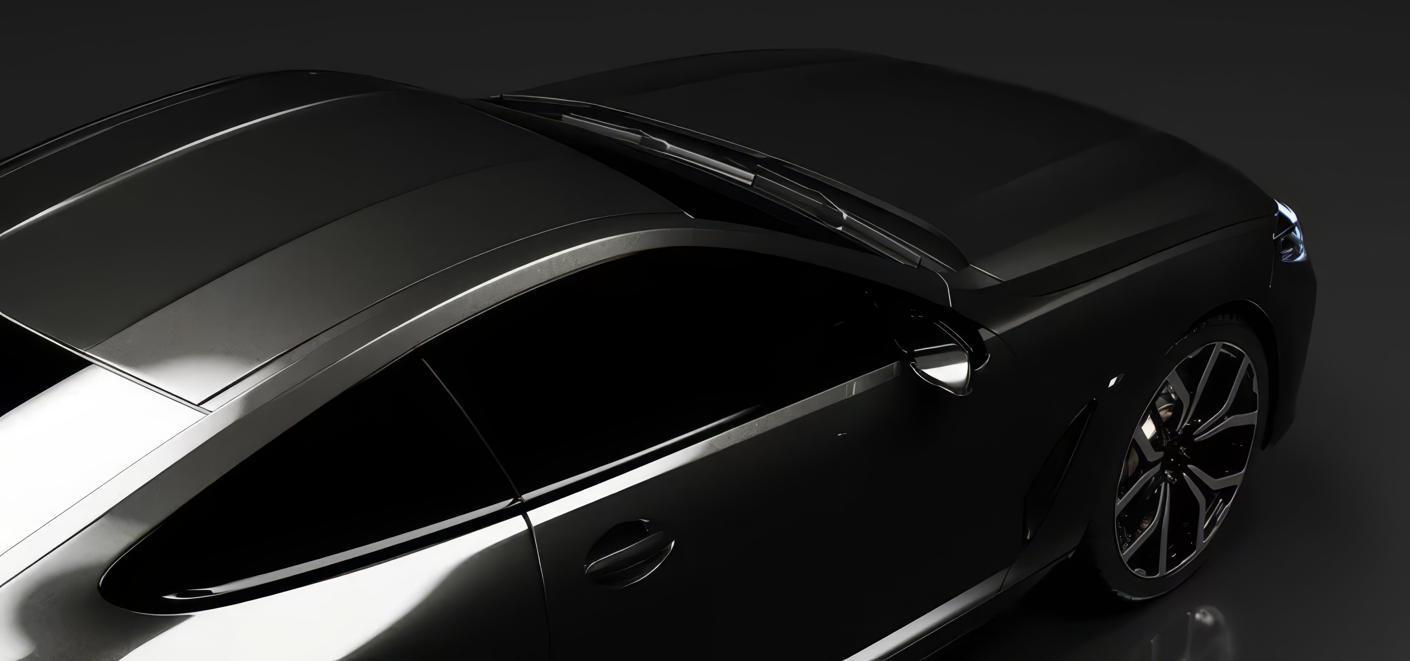 Black luxury car roof and window glass — professional tint